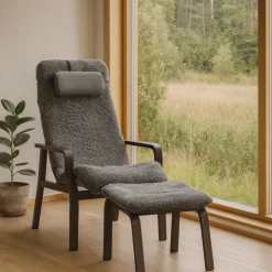 Fårskinnsfåtölj med fotpall - Frank