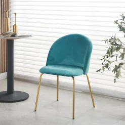 Giovani stol i grön sammet med ben i mässing