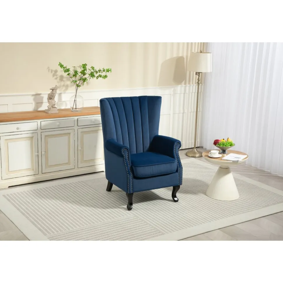 Öronlappsfåtölj i blått sammet