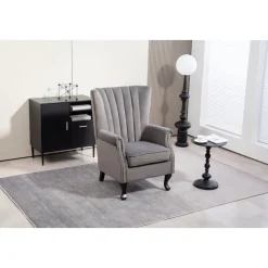 Öronlappsfåtölj i grått sammet